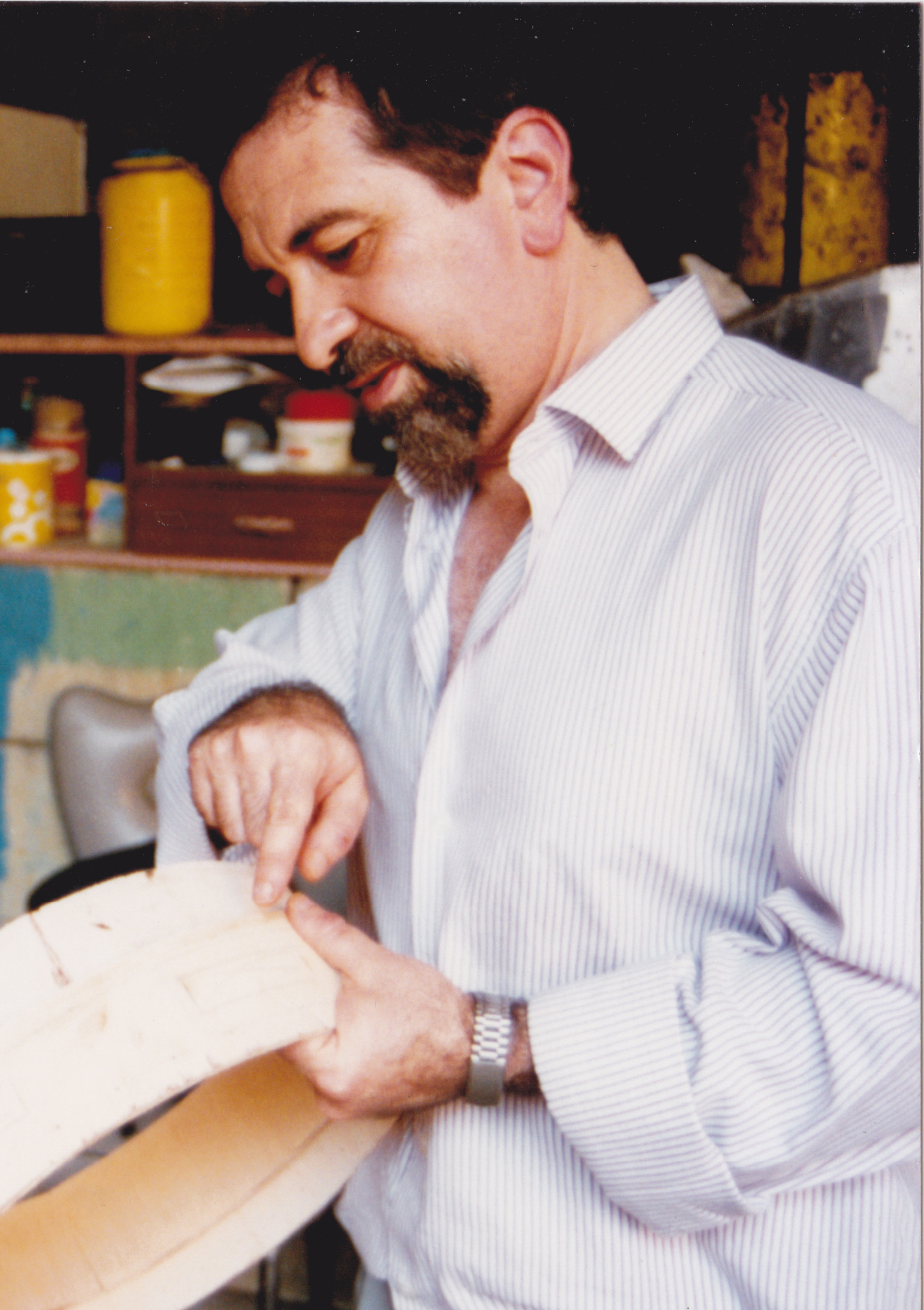 Guzi Gatt inspecting a frame drum in the making.jpg