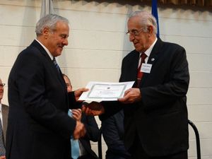 Lewis Stafrace receiving the Certificate of Merit.jpg